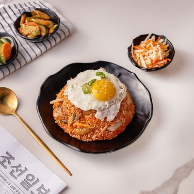 Fried rice with seafood kimchi served with special Korean appetizers