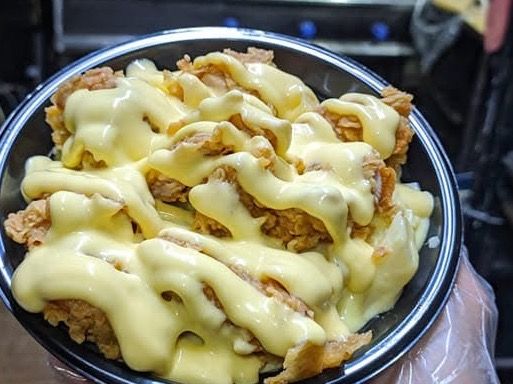 Potato Strips And Cheddar Sauce