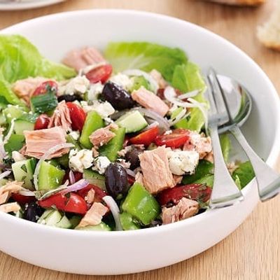 A Mix Of Tuna Salad Pieces And Fresh Vegetables