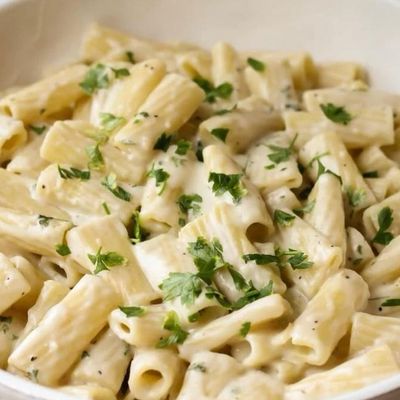 Plain white sauce pasta with olives