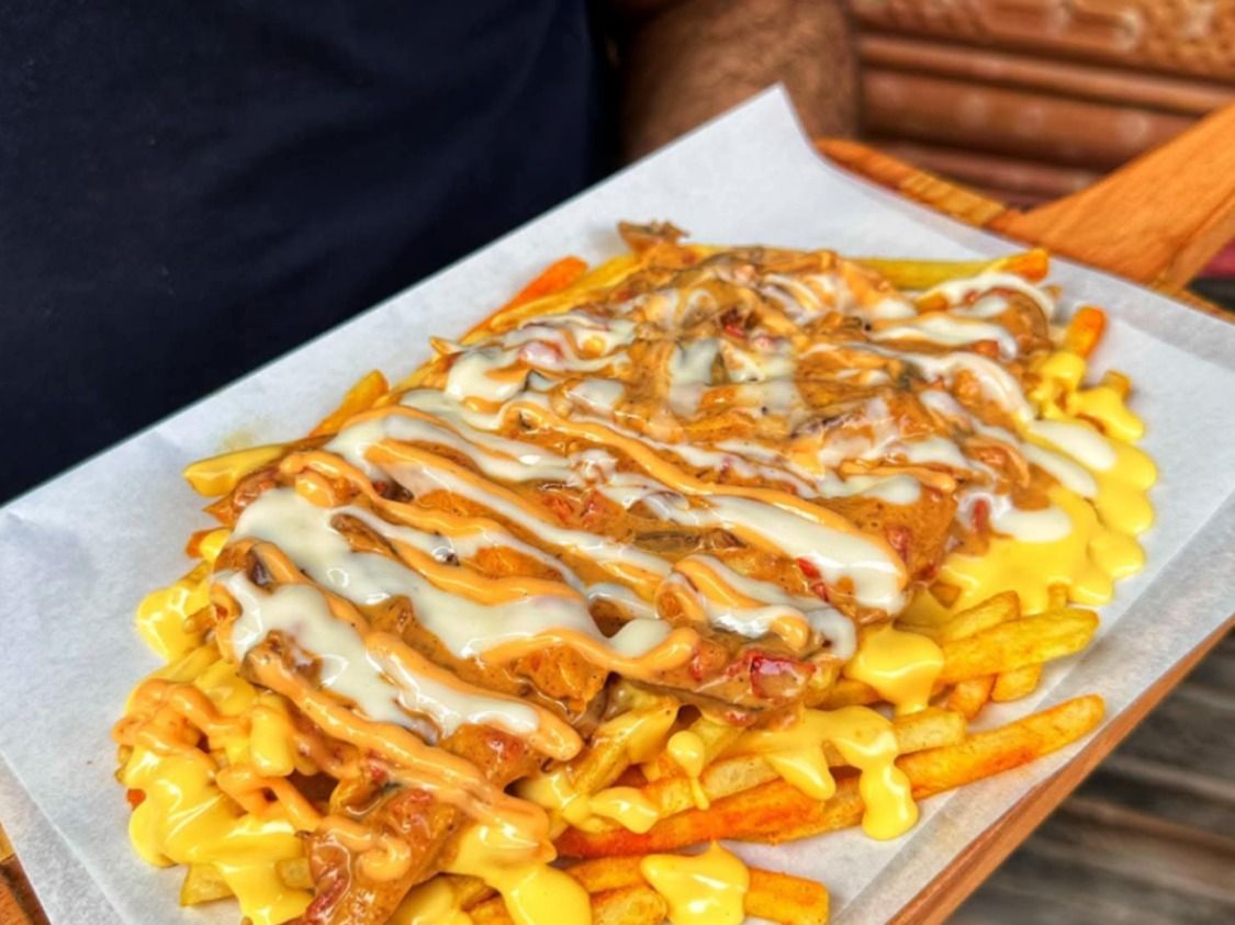 Fried Potatoes With Hot Dog And Melted Mozzarella Cheese