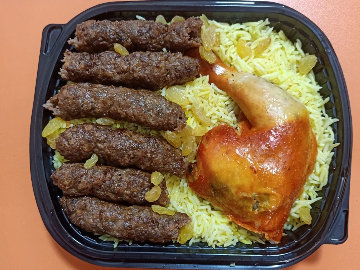 A Quarter Kilo Of Kofta And A Quarter Of Mandi Chicken And Rice