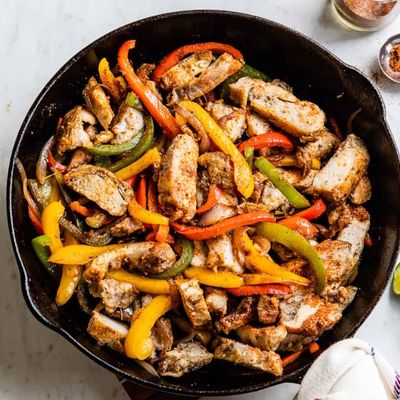 Grilled Chicken Meal with Bell Peppers And Sliced Onions