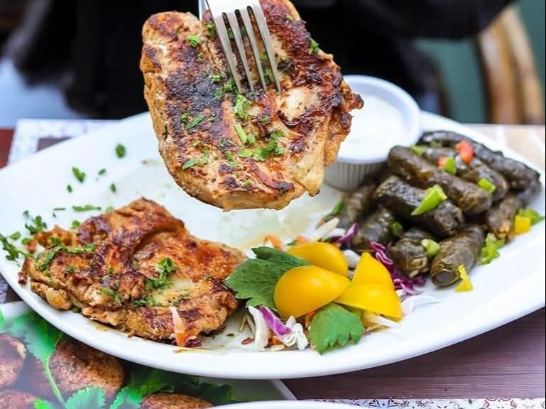 Mahshi Vine Leaves With Yogurt And Half Chicken