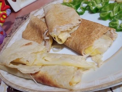 Fried Rumi cheese roll with omelet eggs.