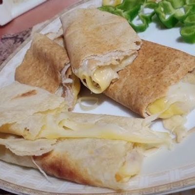 Fried Rumi cheese roll with omelet eggs.