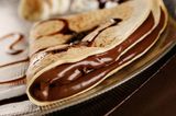 Nutella Chocolate Crepe With Nutella Chocolate Sauce And Pepsi Can Offer