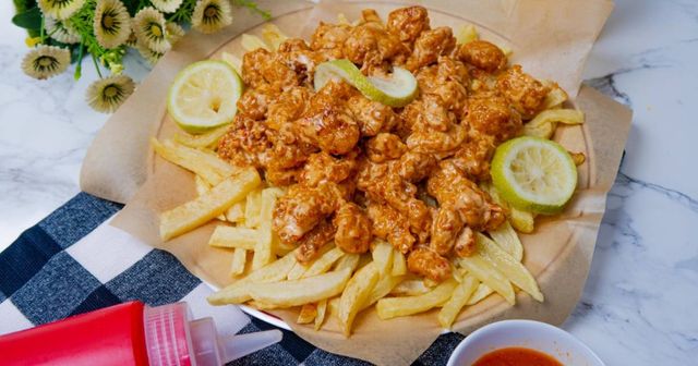 French Fries With Chicken And Curry Sauce