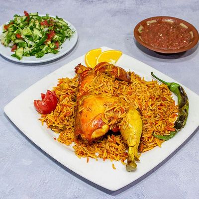 quarter Mandi chicken with rice and spicy Daqoos