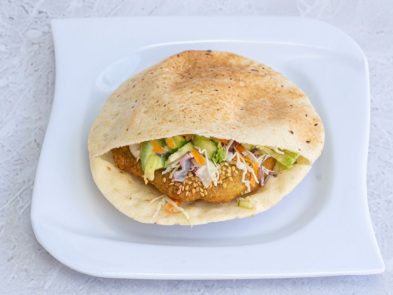 Falafel sandwich with pickled eggplant
