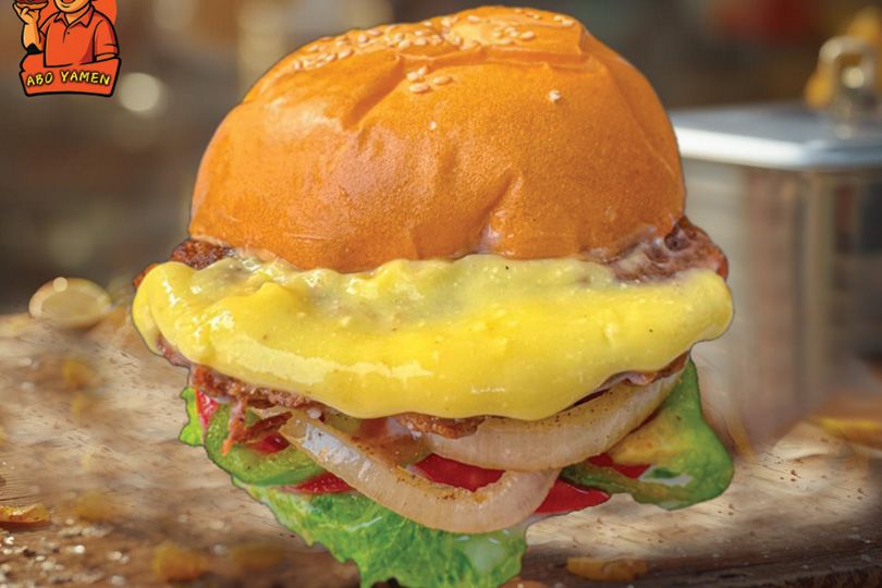 Beef burger with cheese, charcoal grilled