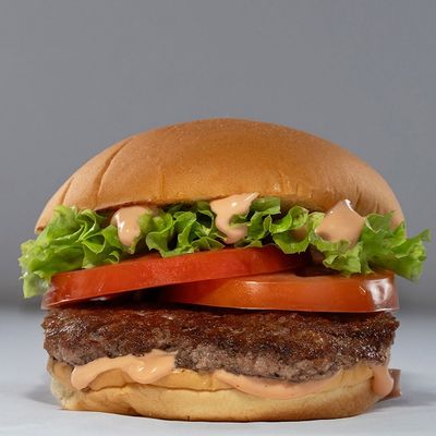 Jumbo burger on charcoal and fries