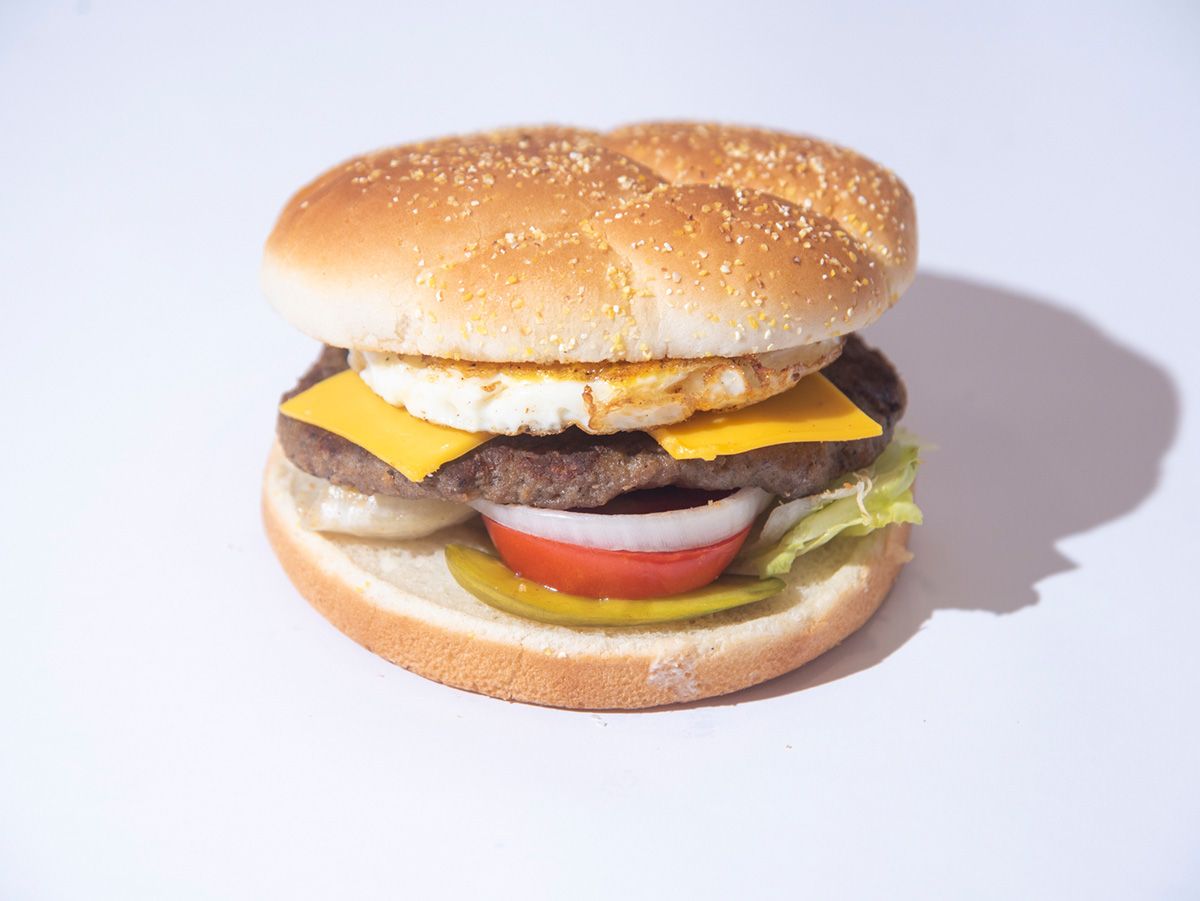 Burger With Cheese And Eggs Sandwich