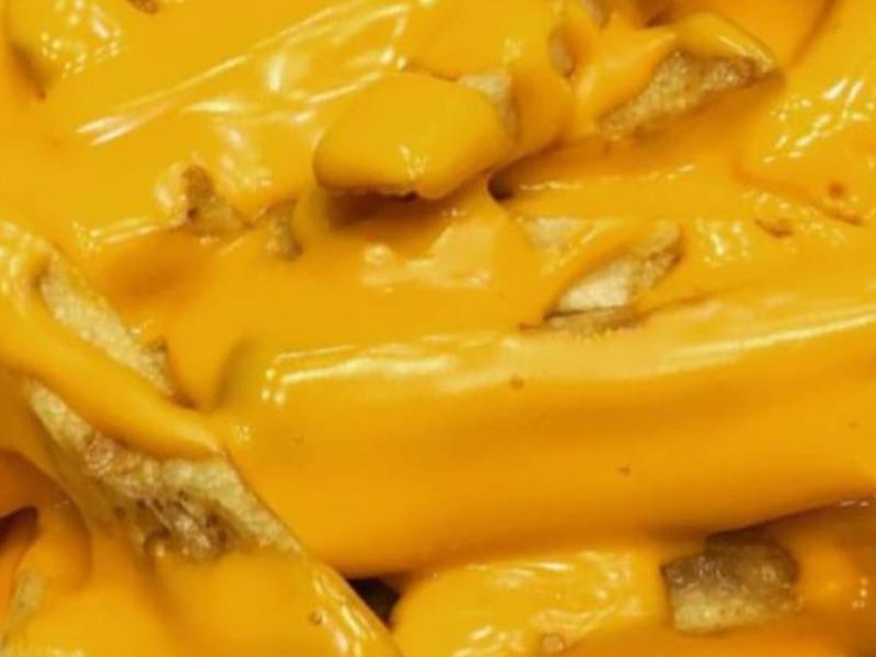 Potatoes with cheese sauce