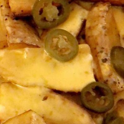 French Fries And Cheddar Cheese Sauce