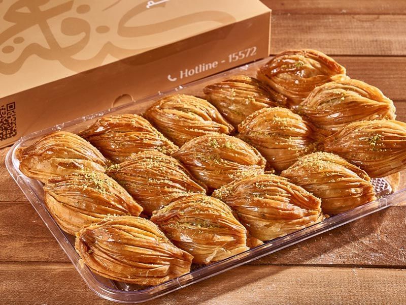 Turkish baklava with cream and pistachios