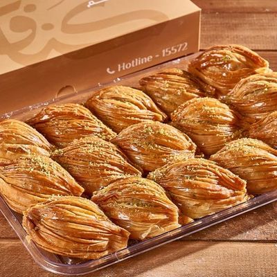 Turkish baklava with cream and pistachios