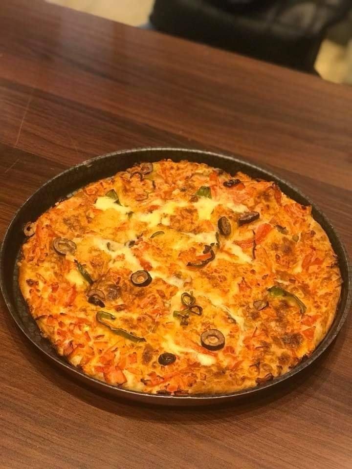 Eastern pizza with baladi sausage