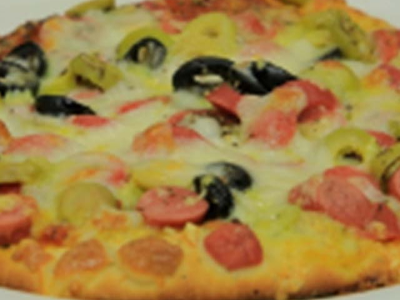 Oriental pizza with sausage and meat