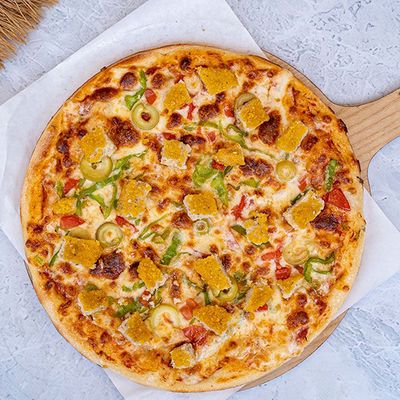 Italian pizza with chicken pastrami