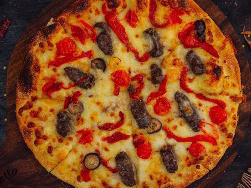 Oriental Alexandrian Sausage Pizza