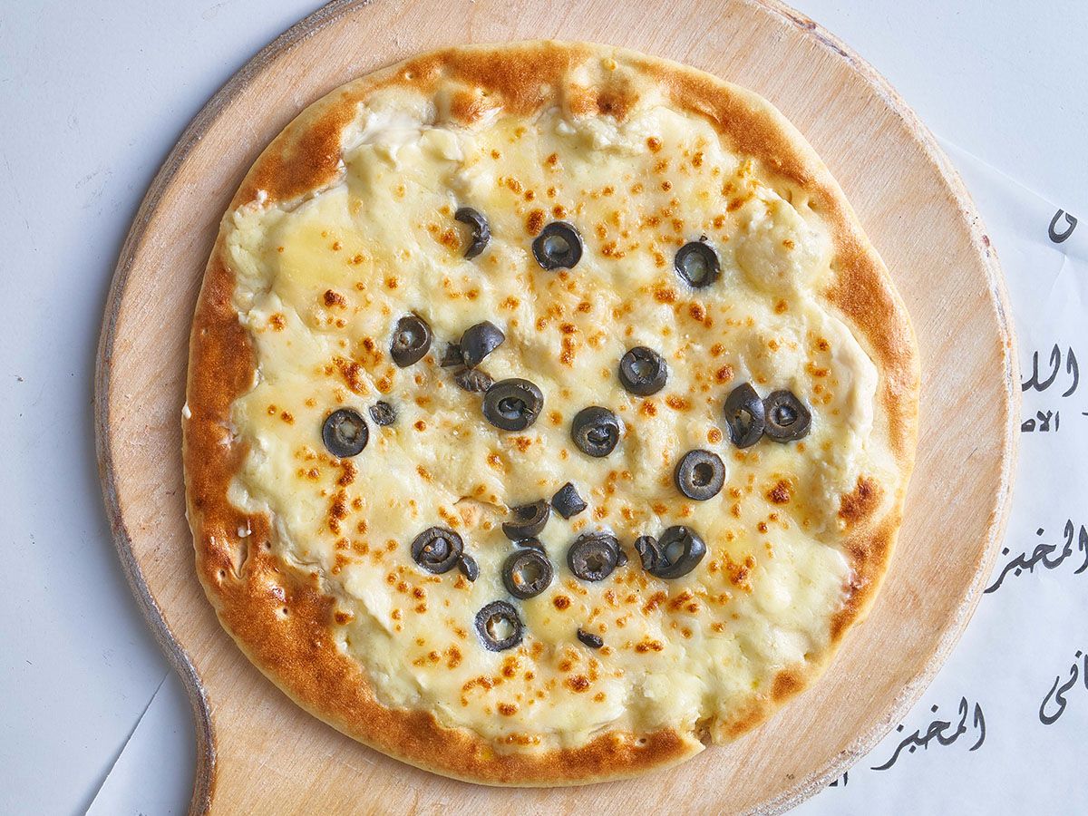 Cheese with olives Manoucheh