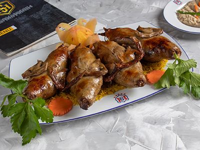Stuffed Pigeon With Grits