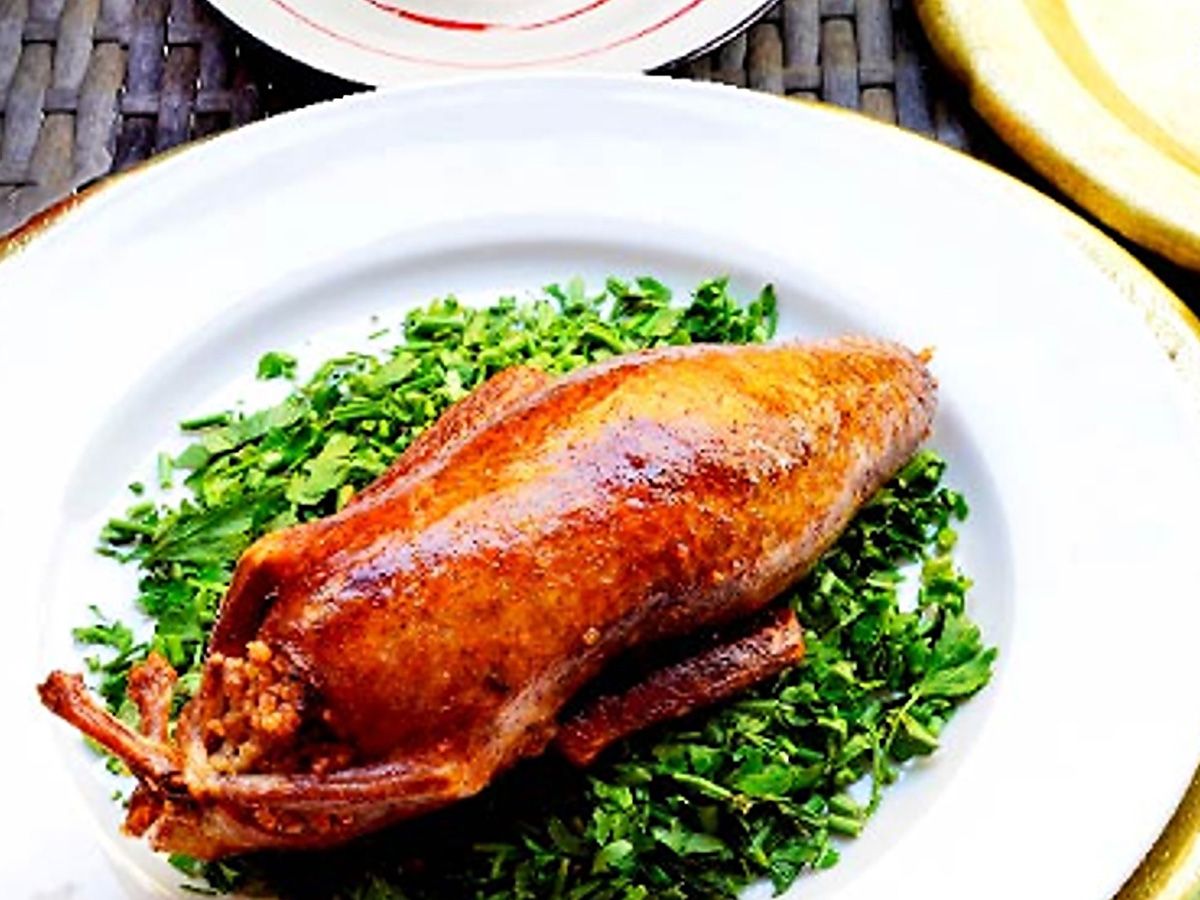 Single Stuffed Pigeon with Grits
