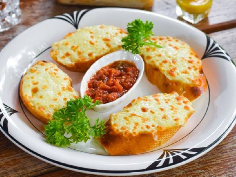 Toasted Bread With Garlic And Mozzarella Cheese