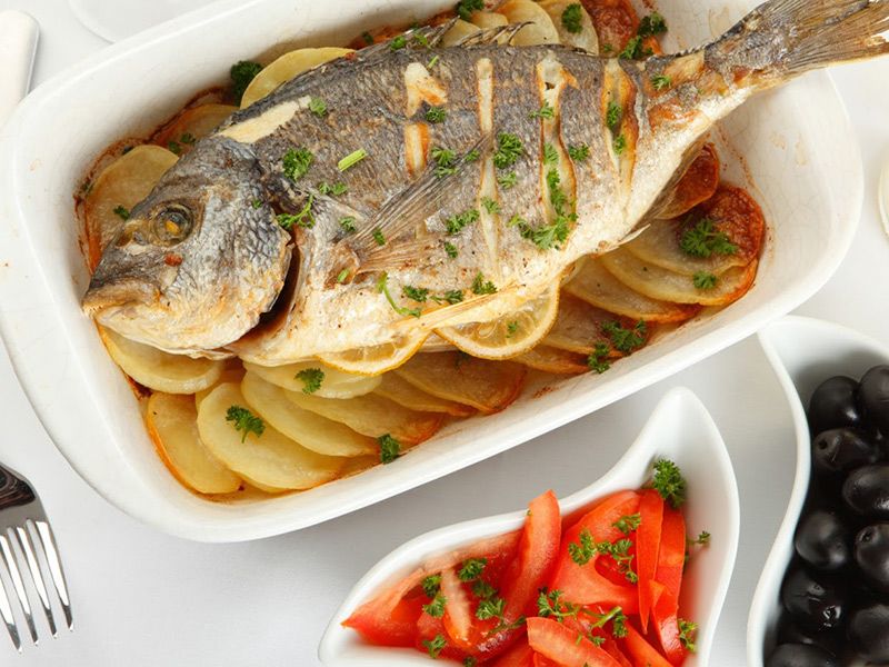 Gilthead Bream Fish With Oil And Lemon
