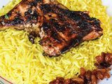Quarter chicken thigh grilled on charcoal