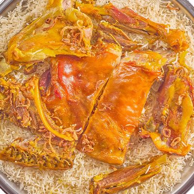 Quarter Mandi Teis on a Plate