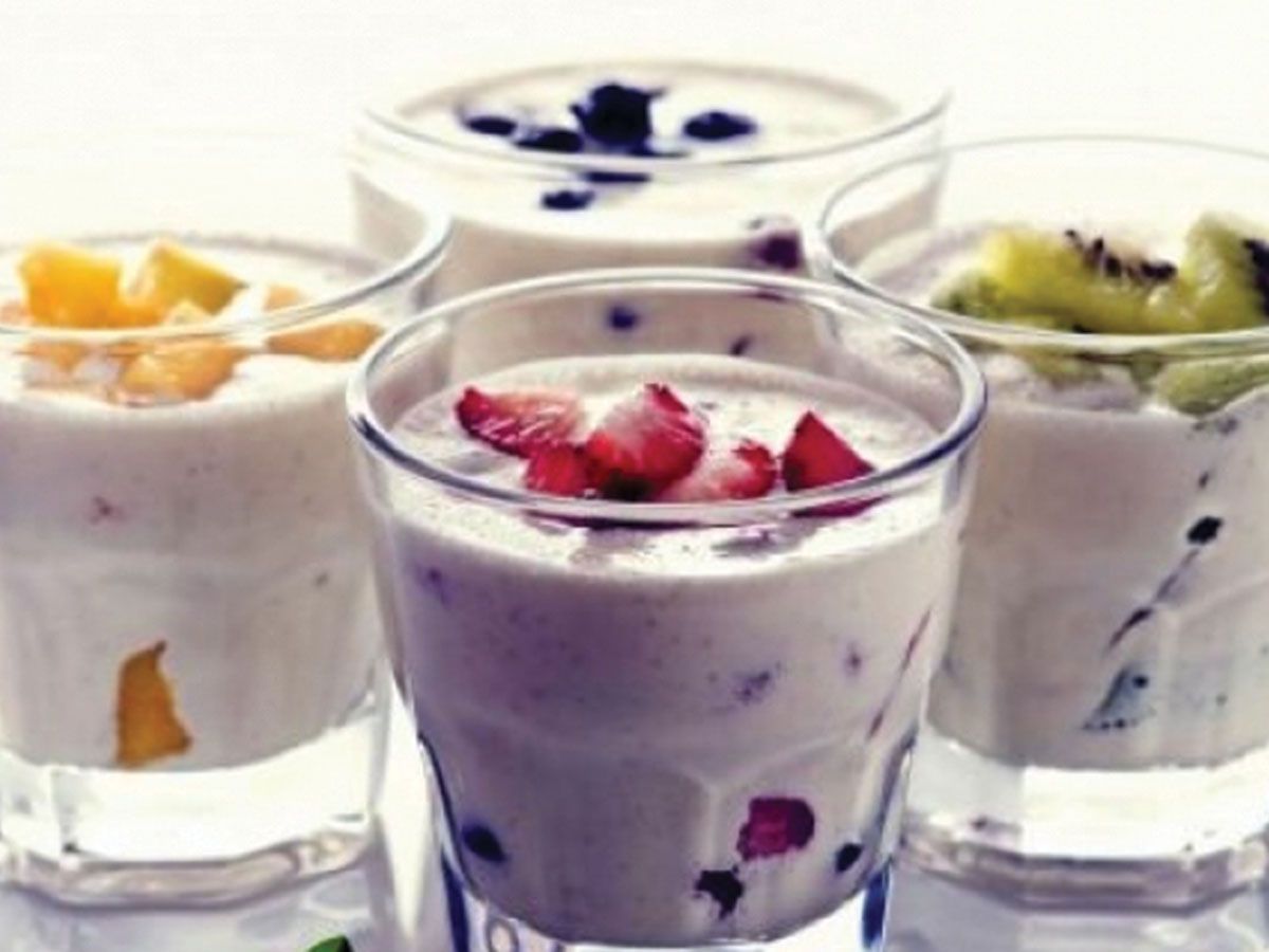 Yogurt with honey and fruits juice