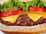 Cheese burger sandwich with fries and Pepsi