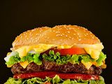 Plain burger sandwich with fries and Pepsi