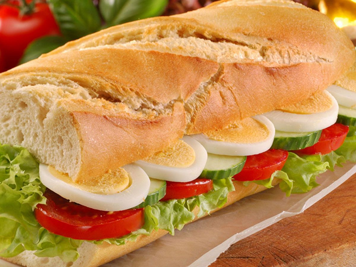 Boiled egg sandwich with tomato slices