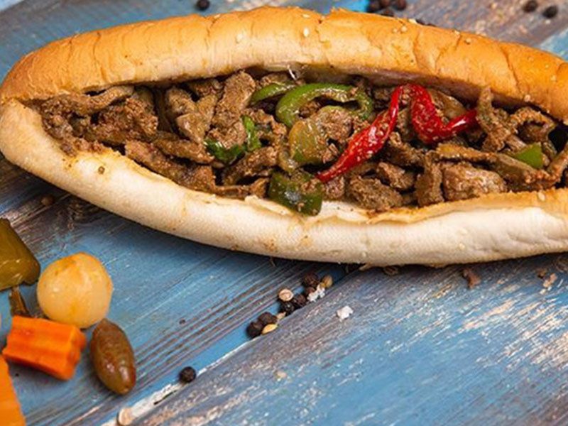 Liver With Pepper And Onion Sandwich