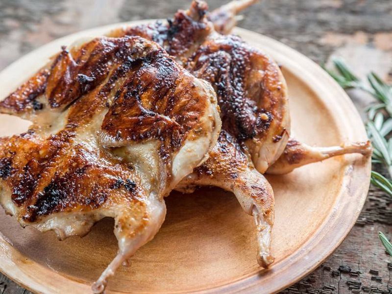Grilled Quail Meal With Mix Appetizers And Drink