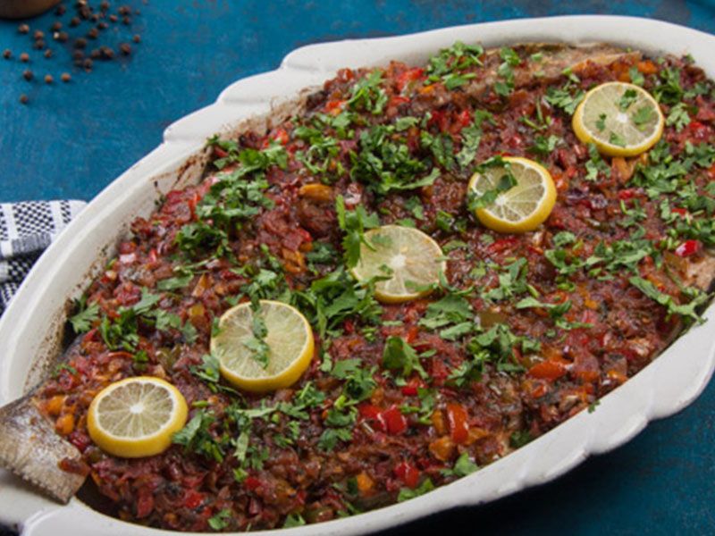Grilled Open Sea Bass Fish With Oil And Lemon