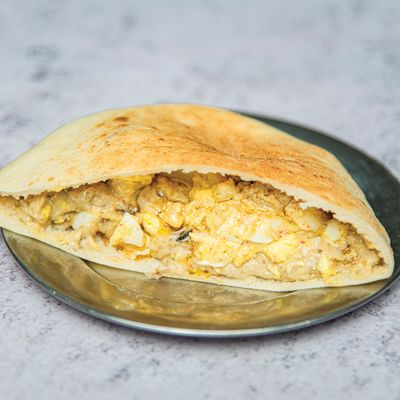 Foul with fried eggs sandwich