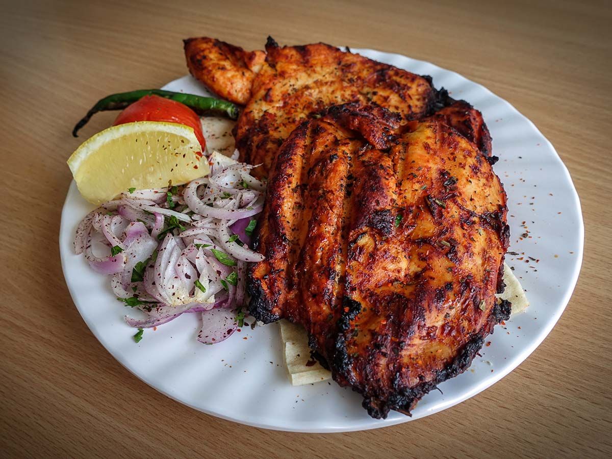 quarter grilled chicken breast with rice