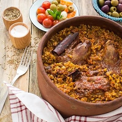 Pigeon tagine with rice / freekeh