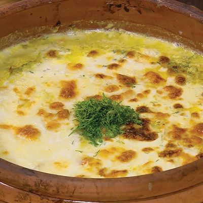 طاجن الحبار بالصلصة البيضاء