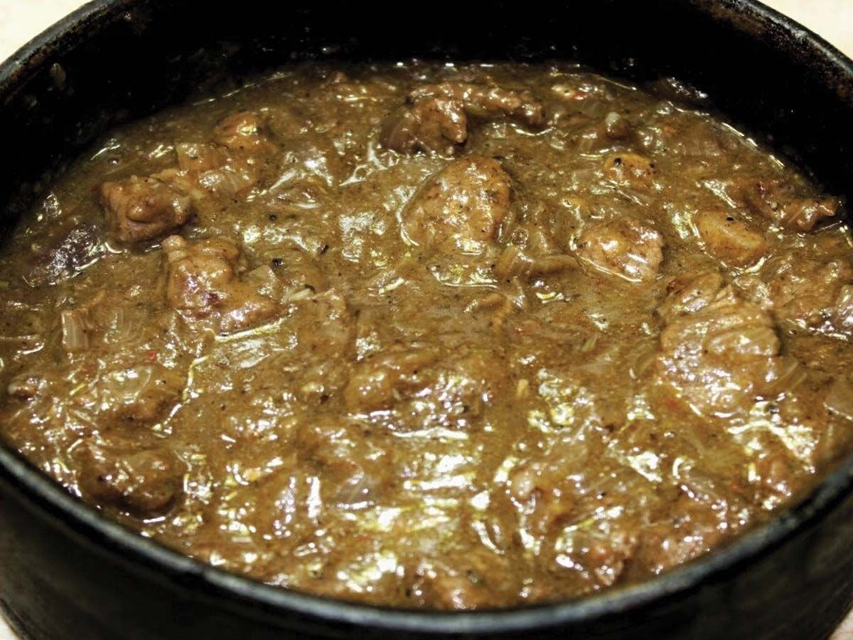 Ostrich meat Casserole with onions and white rice