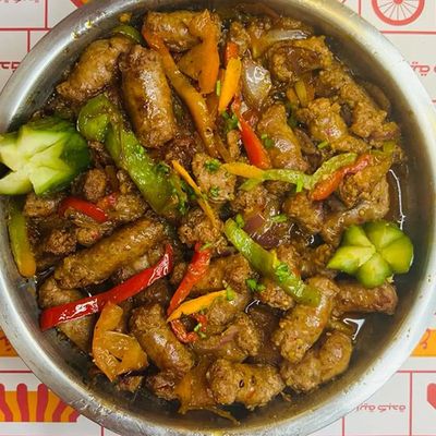 Sausage and pomegranate molasses pan