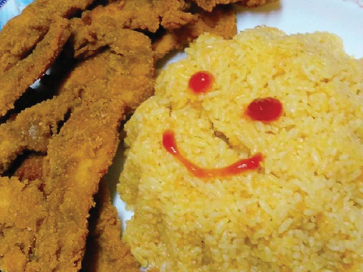 Rice dish with Chicken Pane pieces