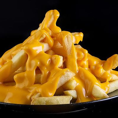 Potato with cheddar sauce dish