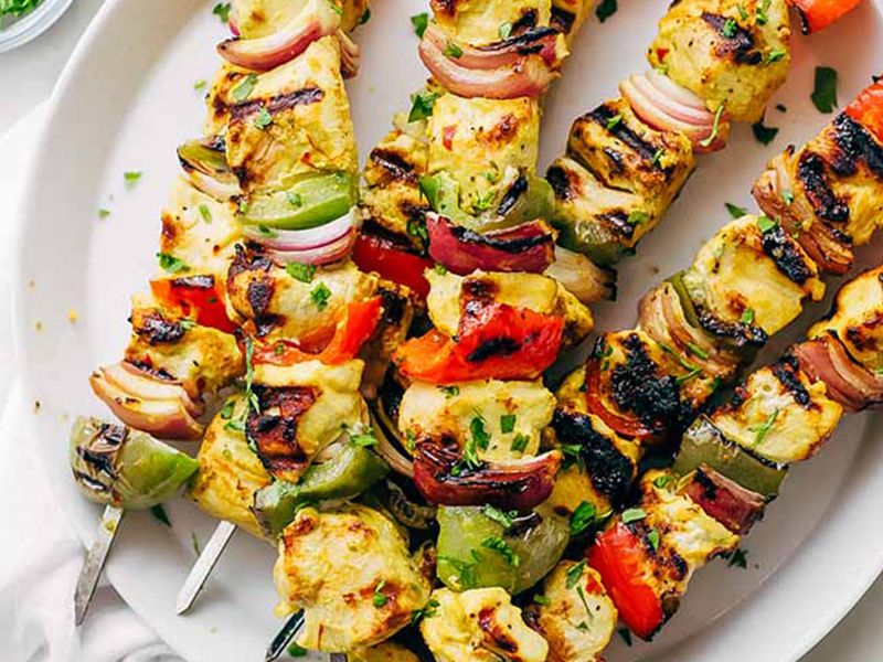 Shish Tawook And Fries And Sauteed Dish