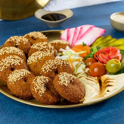 Falafel plate with vegetables and tahini