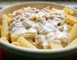 Oriental Sausage Pasta With White Sauce And Mozzarella Cheese